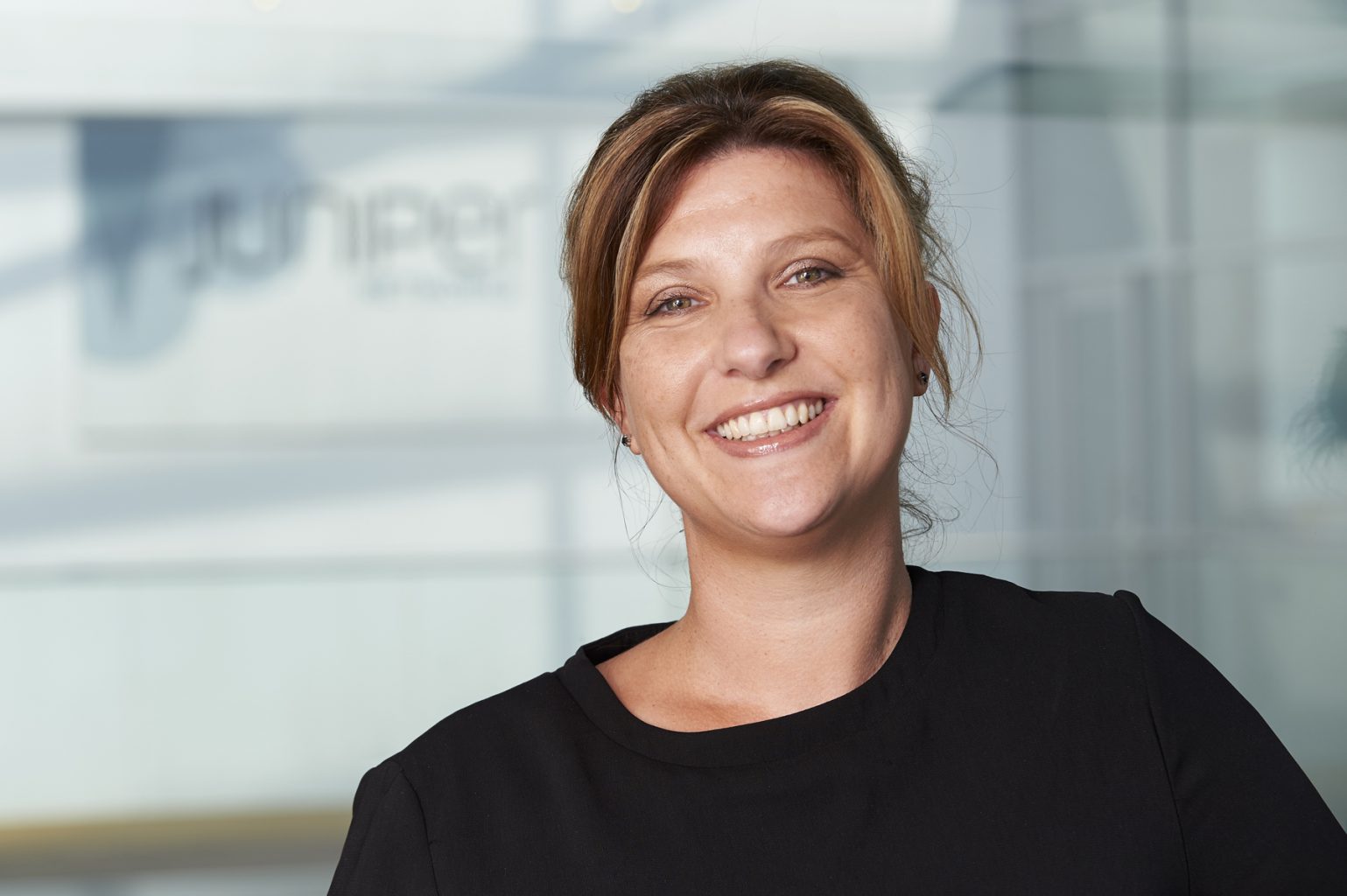 Kate Underdown corporate headshot for Juniper Networks